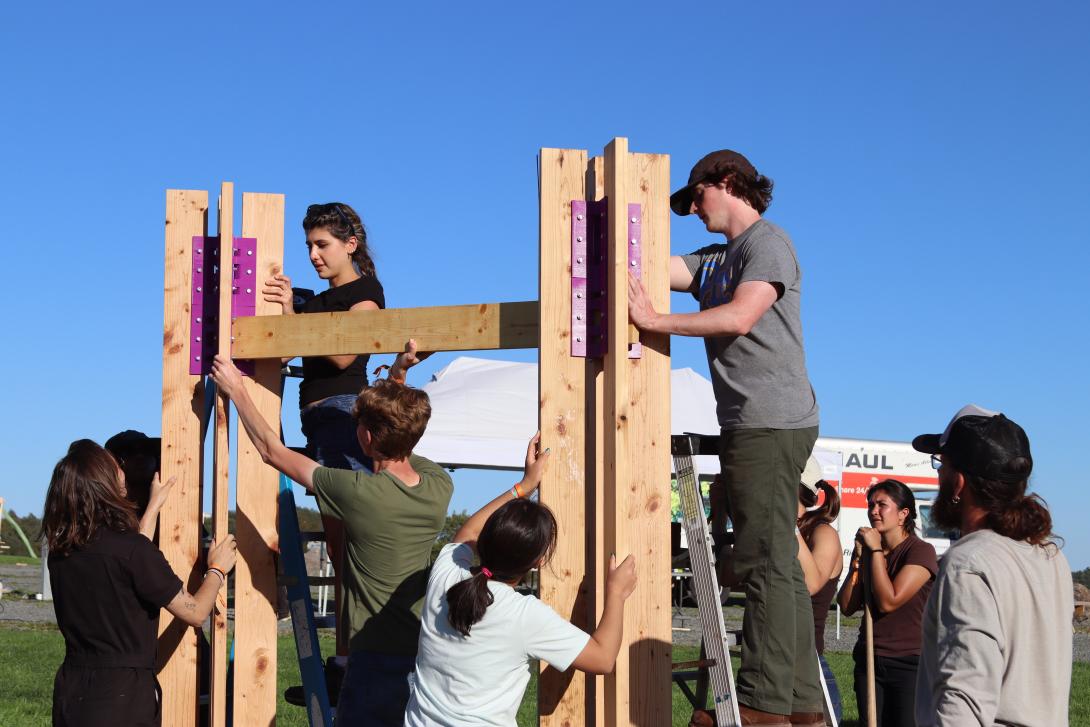 Students assembling the Wildflowers installation at BuildFest.